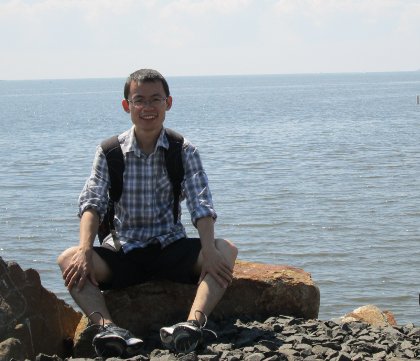 [Photo of Junchang Wang]